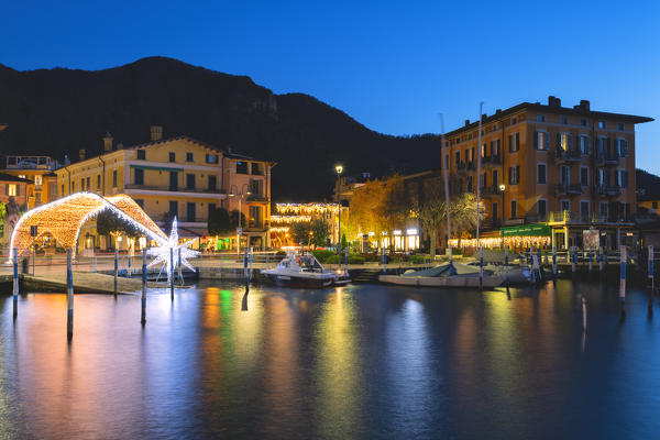 The blue hour in the Christmas village of Iseo, Brescia province, Lombardy district, Italy.