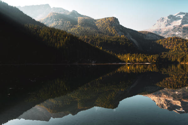 Tovel lake in Non Valley at dawn in autumn season, Trentino Alto Adige, Italy, Europe