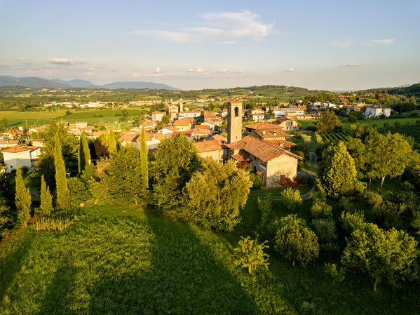 Church of Torbiato surrounded by the Franciacorta vineyards, Brescia province, Lombardy district, Italy.