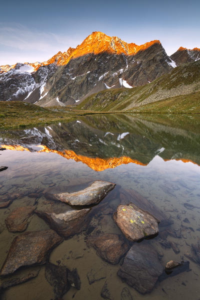 Valmalza lake during a sunrise in Camonica valley, Ponte di Legno, Brescia province, Lombardy, Italy, Europe.