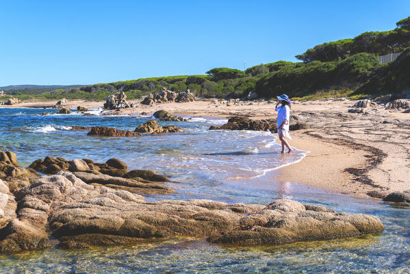 Woman on the beach of Vignola Mare, Sardinia, Sassari province, Italy, Europe.