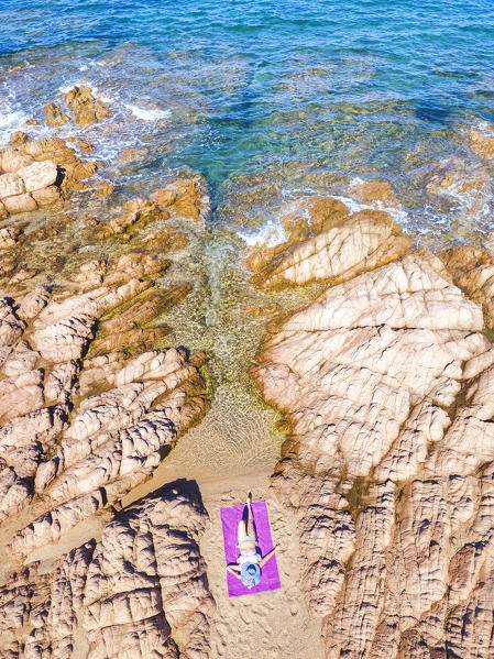 Aerial view of the beach with woman, Vignola mare, Sassari province, Gallura, Italy, Europe, Sardinia.