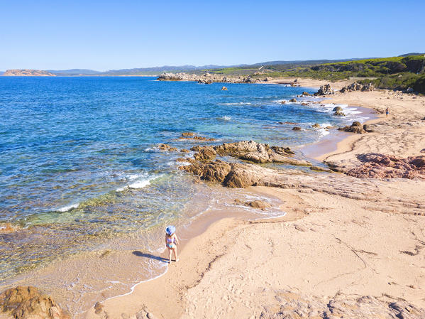 Aerial view of the beach with woman, Vignola mare, Sassari province, Gallura, Italy, Europe, Sardinia.