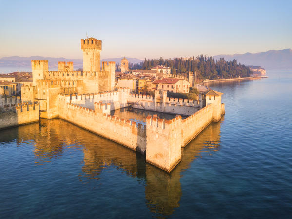 Aerial view at dawn of Sirmione village in Garda lake, Lombardy district, Brescia province, Italy, Europe.