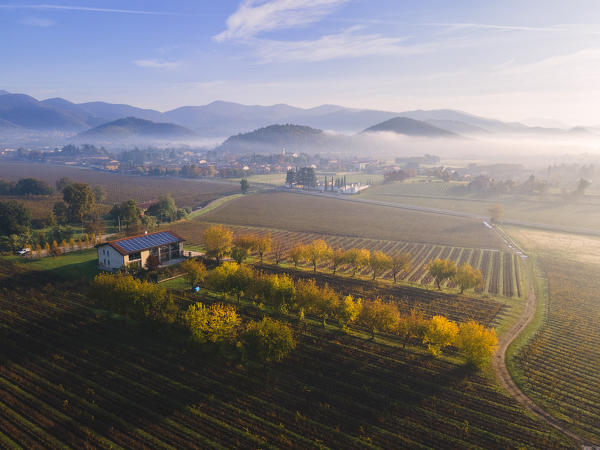 Aerial view of Franciacorta in autumn season, Brescia province, Lombardy district, Italy.