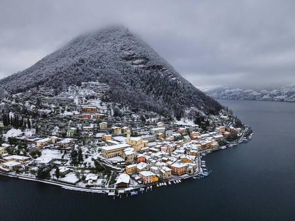 Aerial view of Peschiera Maraglio village in Montisola in winter season, Brescia province in Lombardy district, Italy, Europe.