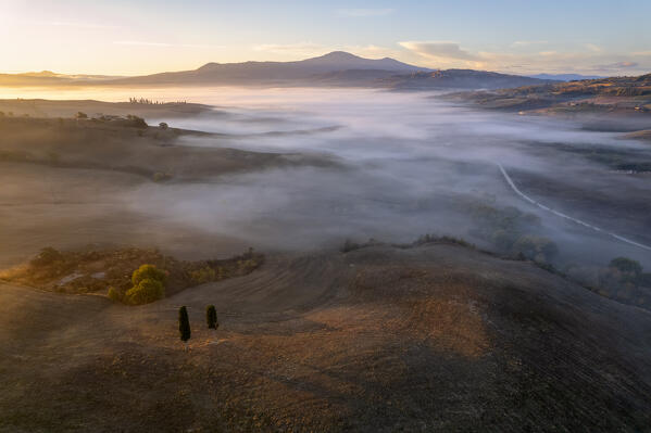 Aerial view in the morning, Orcia valley in Siena province, Tuscany, Italy.