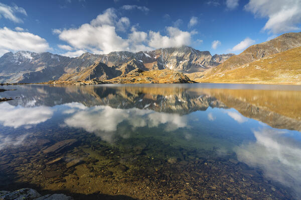 Black lake at Gaviapass in the morning, Brescia province in Lombardy district, Italy.