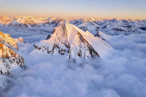 Italian alps sunrise aerial view in Lombardy district, Brescia province in Italy.