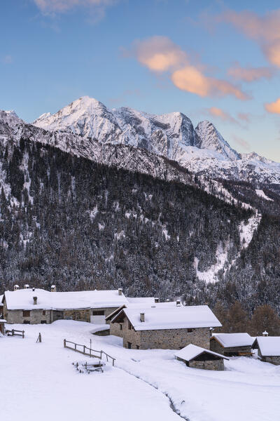 Sunrise in Ponte di Legno, a little village of Vescasa Alta in winter season, Brescia province in Lombardy district.