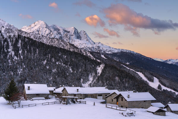 Sunrise in Ponte di Legno, a little village of Vescasa Alta in winter season, Brescia province in Lombardy district.