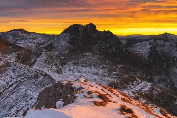 Landscape from italian alps during a winter sunrise in Adamello park, Brescia province in Lombardy district, Italy.