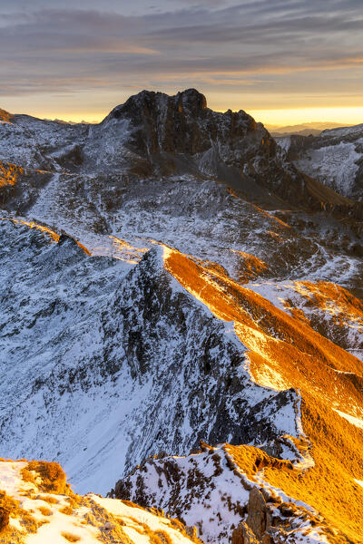 Landscape from italian alps during a winter sunrise in Adamello park, Brescia province in Lombardy district, Italy.