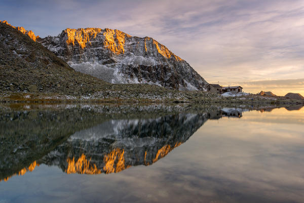 Tonolini Refuge at sunset, Adamello park, province of Brescia, Italy