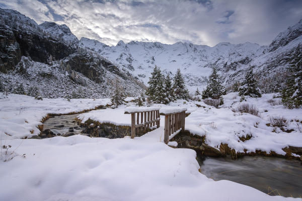 The bridge for the winter, Adamello park, province of Brescia, Lombardia, Italy