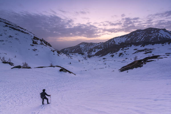 Hiker in Adamello Park,province of Brescia, Italy.