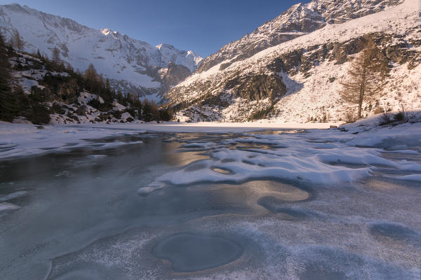 Thaw in Aviolo lake, Adamello park, province of Brescia, Italy.