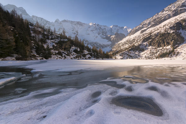 Thaw in Aviolo lake, Adamello park, province of Brescia, Italy.