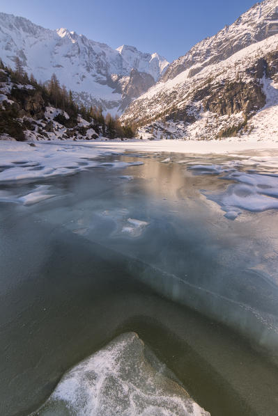 Thaw in Aviolo lake, Adamello park, province of Brescia, Italy.