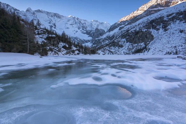 Aviolo lake at thaw, Adamello park, province of Brescia, Italy.