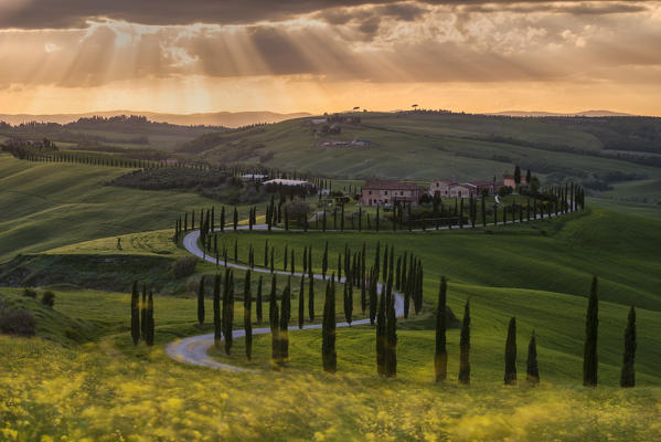 Europe, Italy, Baccoleno farmhouse at sunset, Crete Senesi, province of Siena.