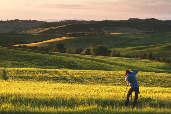 Europe, Italy photographer in Orcia valley, province of Siena, Tuscany.