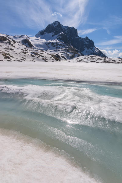 Europe, Italy, thaw at vacca Lake, Adamello park, province of Brescia.