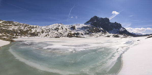 Europe, Italy, thaw at vacca Lake, Adamello park, province of Brescia.