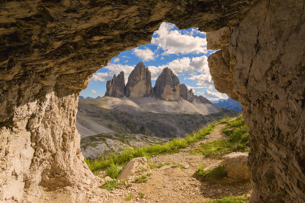 Three peaks of Lavaredo views from a cave, Bolzano Province, Trentino Alto Adige, Italy.