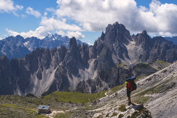 Hiker in dolomites, Belluno province, Veneto, Italy.