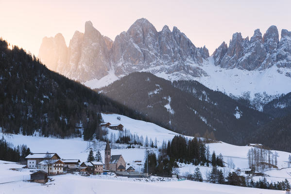 Sankt Magdalena in a winter sunrise in Funes valley, Odle Natural park in Trentino Alto Adige district, Italy, Bolzano province, Europe.