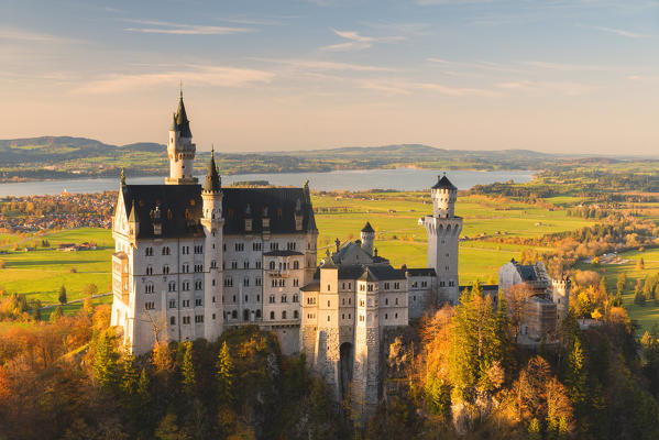 Neuschwanstein Castle in Autumn at sunset Europe, Germany, Bavaria, southwest Bavaria, Fussen, Schwangau