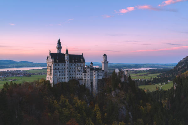 Neuschwanstein Castle in Autumn at sunset. Europe, Germany, Bavaria, southwest Bavaria, Fussen, Schwangau