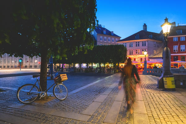 Tourist in Nyhavn, Copenhagen, Hovedstaden, Denmark, Northern Europe.