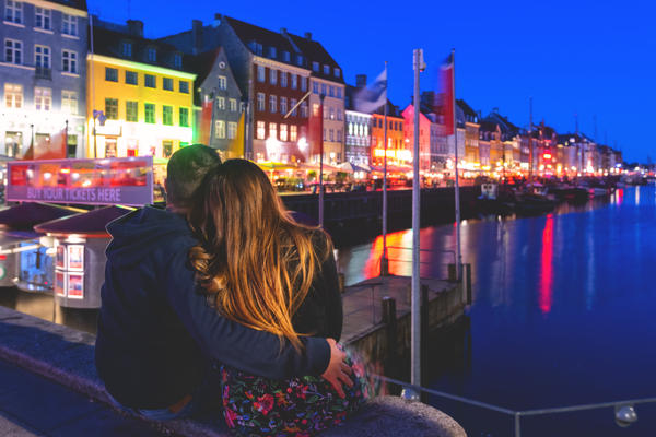 Tourist in Nyhavn, Copenhagen, Hovedstaden, Denmark, Northern Europe.