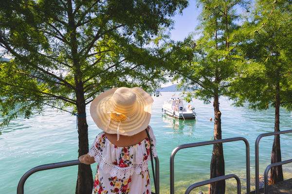 Tourist in the streets of Peschiera Maraglio, Monteisola, Brescia province, lombardy district, Italy.