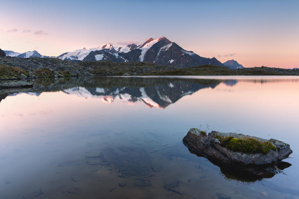 Manzina lake at sunrise, Valtellina, Stelvio national park in Santa Caterina Valfurva, Lombardy district, italy.