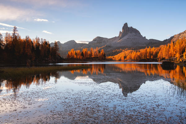 Autumn sunrise at Lake Federa, Cortina d'Ampezzo, Veneto, Italy.