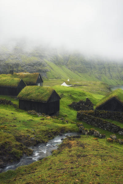 Saksun, Stremnoy island, Faroe Islands, Denmark. Iconic green roof houses.