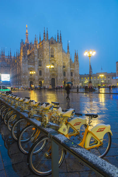 Milan's Duomo cathedral in winter with snow and artificial lights. Milan, Lombardy, Italy