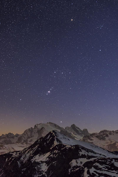 Marmolada, Giau Pass, Belluno, Veneto, Cadore, Dolomites, Italy. Orion's constellation over Marmolada