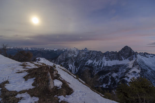 Sassolungo di Cibaba, Monte Rite, Cibiana di Cadore, Belluno, Dolomites, Veneto, Italy. Moonrise at Monte Rite