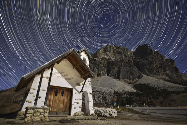 Lagazuoi, Falzarego pass, Cortina d'Ampezzo, Dolomiti, Dolomites, Belluno, Veneto, Italy. Startrail at Falzarego's church