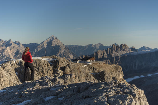 Lagazuoi mount, Falzarego Pass, Dolomiti, Dolomites, Belluno, Veneto, Italy. hiker look at Lagazuoi refuge