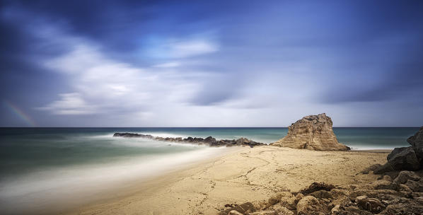 Tropea, Calabria, Italy. Long exposure during a storm with rainbow