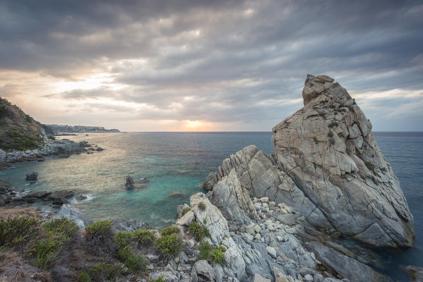 Tropea, Province of Vibo Valentia, Calabria, Italy. Panoramic view of the Scoglio della Pizzuta towards Tropea at sunset.