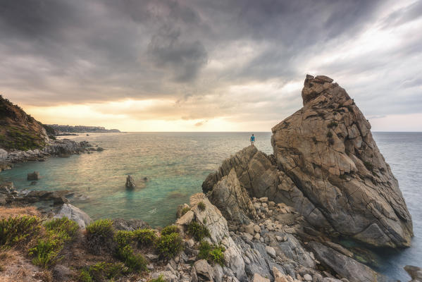 Tropea, Province of Vibo Valentia, Calabria, Italy. Panoramic view of the Scoglio della Pizzuta towards Tropea at sunset.