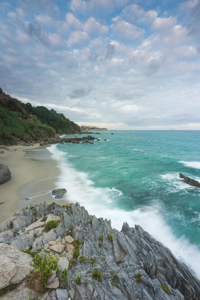 Parghelia, Province of Vibo Valentia, Calabria, Italy. Dawn at Parghelia (Michelino's Beach) with Tropea on the background.