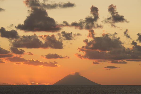 Tropea, Province of Vibo Valentia, Calabria, Italy. Sunset over the Stromboli's Vulcan