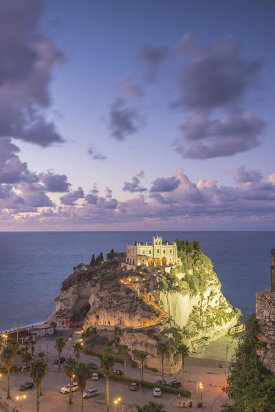 Tropea, Province of Vibo Valentia, Calabria, Italy. The Santa Maria dell'Isola seen from Piazza del Cannone at dusk.